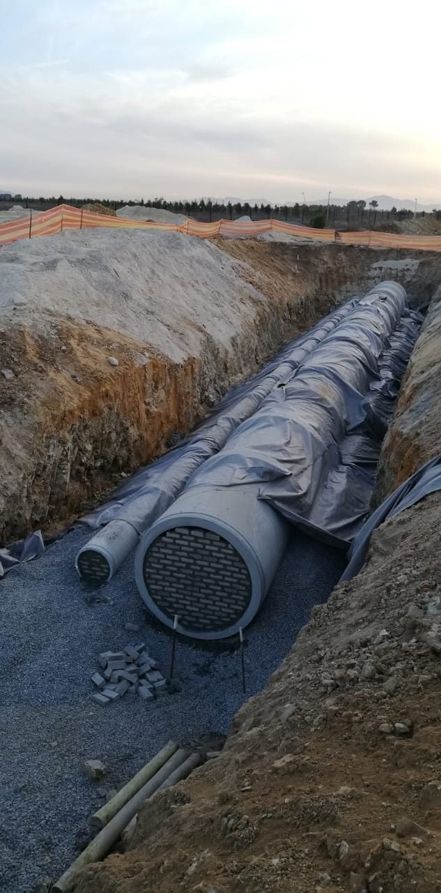 Large stormwater culvert pipes bedded in a trench